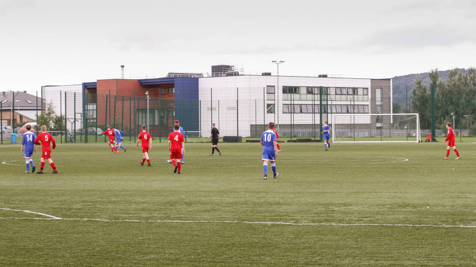 Learners playing football on 3G pitch