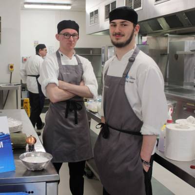 Students Ben Nield and Callum Hagan in the kitchen at the Orme View restaurant at Coleg Llandrillo