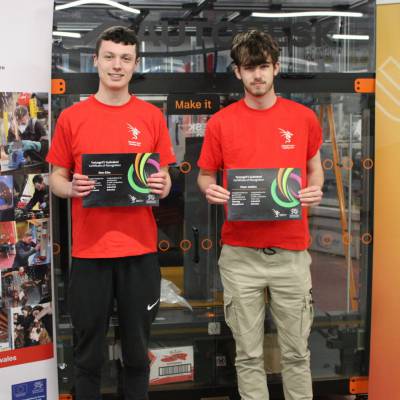 Coleg Menai students Sion Elias and Peter Jenkins with their certificates after competing in Skills Competition Wales 2024