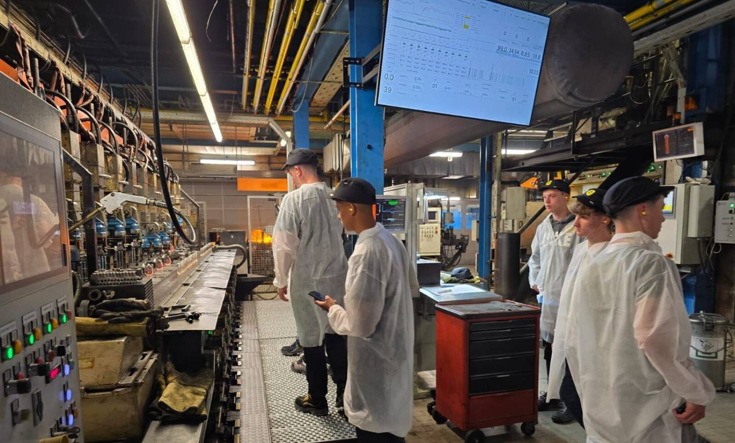 Students visiting the HeinzGlas factory during a trip to Germany