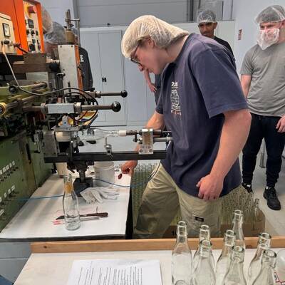 Students gaining experience of manufacturing bottles at the HeinzGlas factory