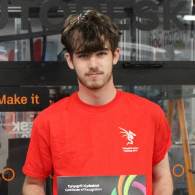 Peter Jenkins with his certificate after competing in Skills Competition Wales 2024