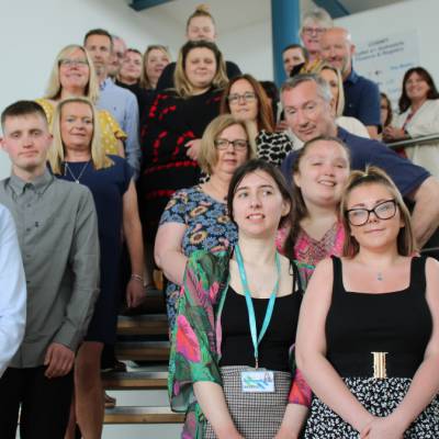 Learners celebrating at Coleg Llandrillo in Rhos-on-Sea after completing their Project SEARCH internships