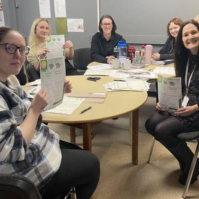 Blossom & Bloom founder Vicky Welsman-Millard, tutor Samantha Hunt and learners with their certificates after completing a Multiply course