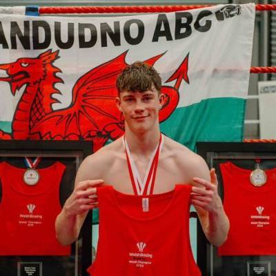 Mitchel Jones with his medals and Welsh Boxing vests