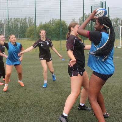 Rugby academy students training on the 3G pitch at Coleg Llandrillo in Rhos-on-Sea