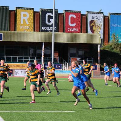 Grŵp Llandrillo Menai’s girls rugby academy team in action against Cardiff and The Vale College