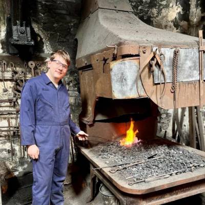 Dai Ifor Evans-Jones working at a blacksmith’s forge