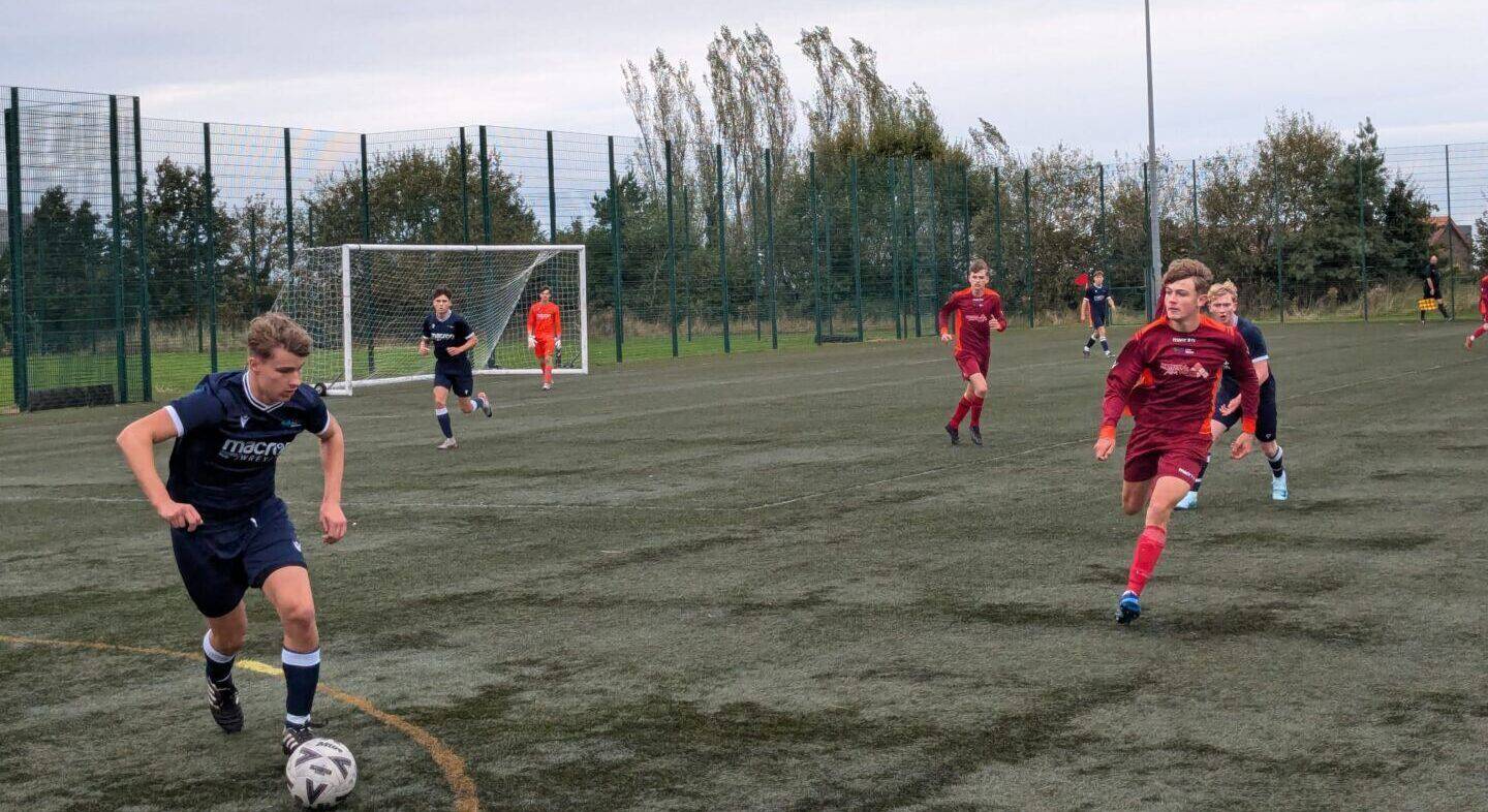 Action from the game between Coleg Llandrillo and Coleg Menai / Coleg Meirion-Dwyfor on the 3G pitch at the Rhos-on-Sea campus