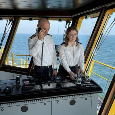 Former student Stephanie at the bridge of the Purus Horizon with the ship’s captain