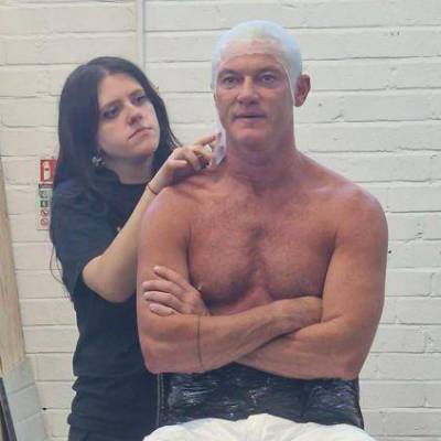 Former Coleg Menai student Mabli Non Jones working on a ‘lifecast’ mould with actor Luke Evans