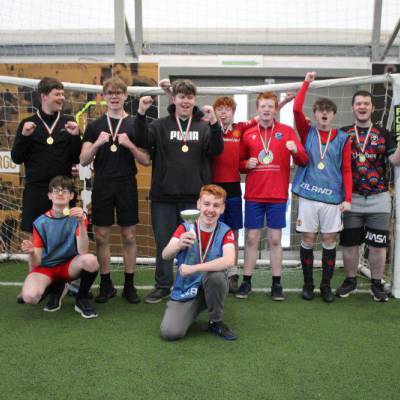 The Coleg Meirion-Dwyfor Dolgellau team with their medals and trophy after winning the North Wales Ability Counts football tournament