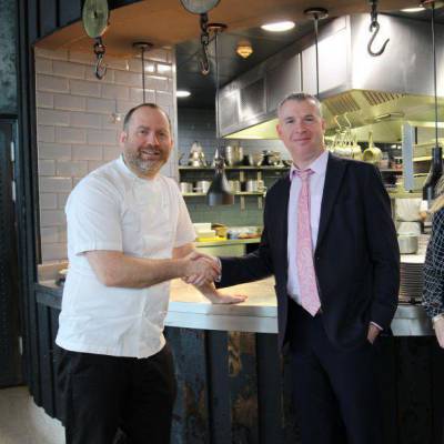 Bryn Williams with Paul Flanagan, Coleg Llandrillo Principal, and Samantha McIlvogue, Coleg Llandrillo Assistant Principal, at Porth Eirias