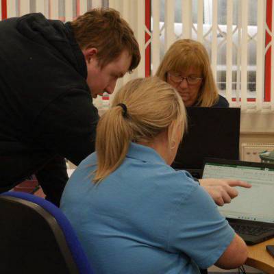 NHS staff learning to use spreadsheets with Multiply tutor Stephen Jones