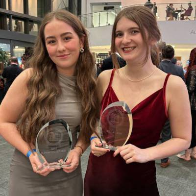 Ffion Jones and Anna Walker with their awards at the It’s My Shout awards ceremony 2025