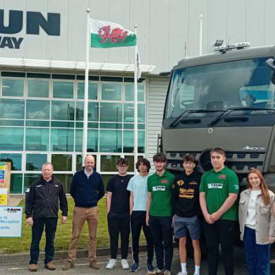 Coleg Meirion-Dwyfor students with FAUN Trackway staff members Gwyn Parry, Gareth Williams, Ellie Roberts and Rhodri Farrer.