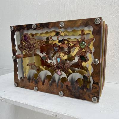 ‘Warming Waters’, a piece of metal artwork by Mali Smith on display at the UAL Origins Creative exhibition in London