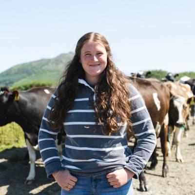 Glynllifon student Gwenllian Lloyd Davies in front of a herd of cattle