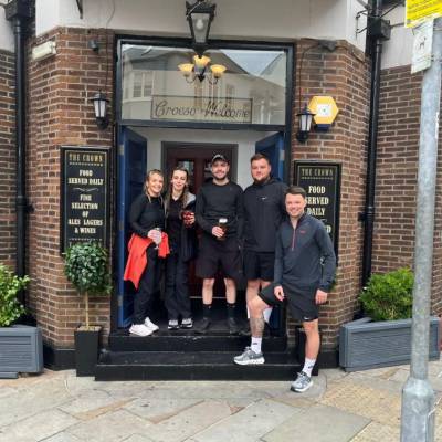 Dylan Parry (far right) and friends outside the Crown pub in Caernarfon after their sponsored walk