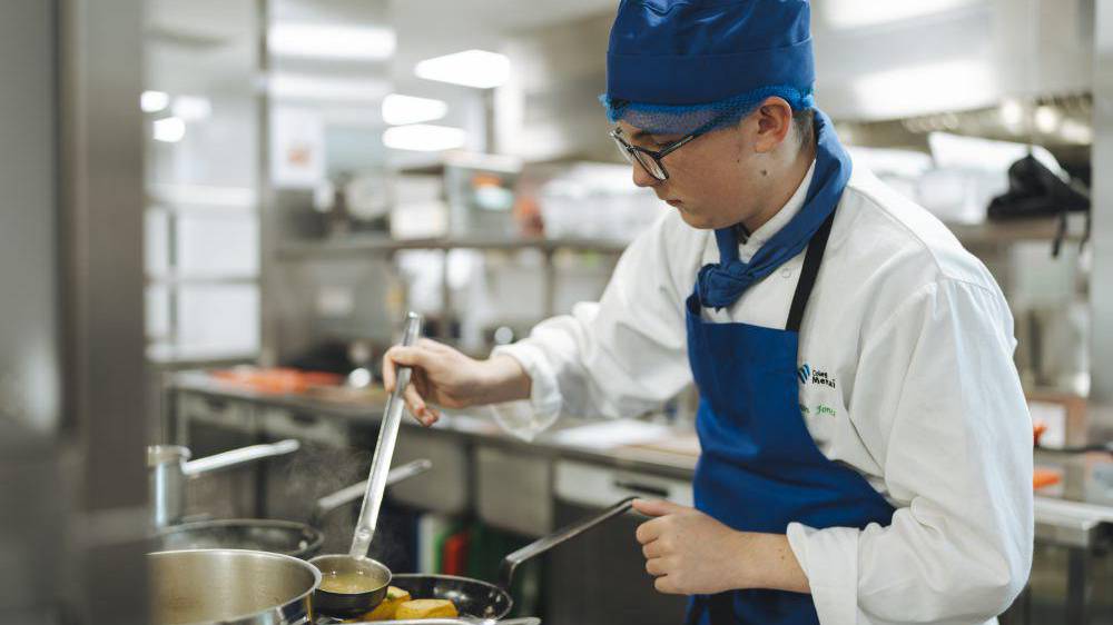 Student in a kitchen