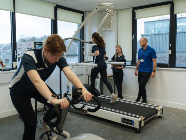 Students using sports equipment