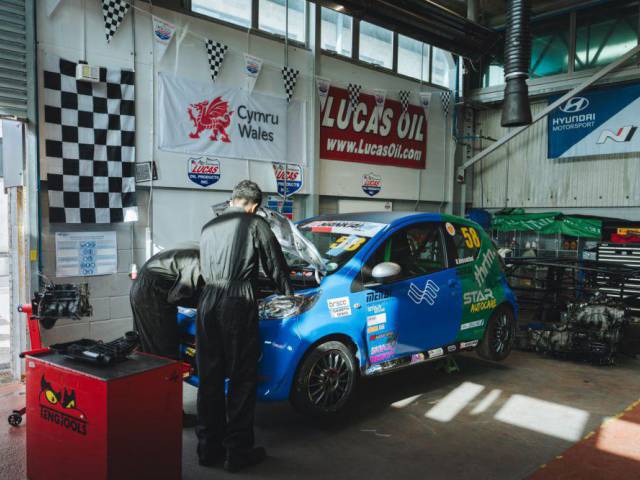 Students working on a car